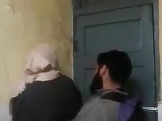 A hijab-wearing woman has sex with multiple men at Louisiana State University.